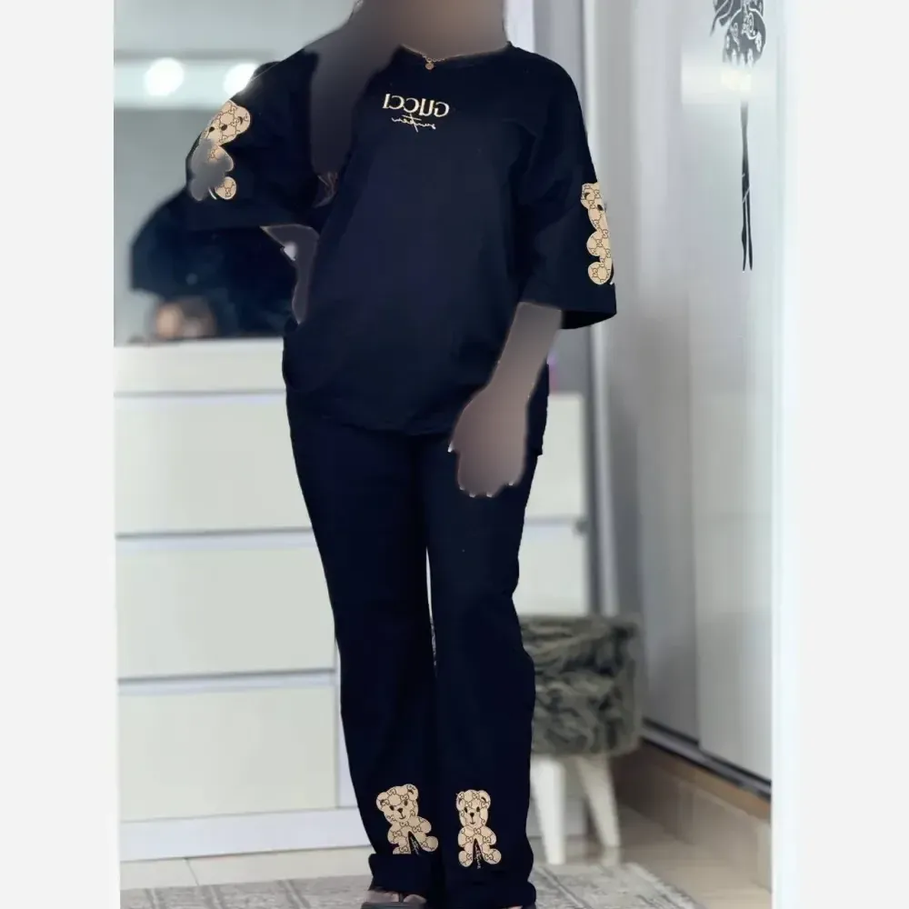 ست تیشرت و شلوار زنانه مدل چشمه جنس پنبه و گلکسی اسپان فری سایز مشکی