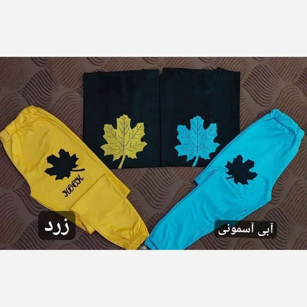 ست دوتیکه تیشرت لانگ و شلوار دمپا کش طرح برگ سایز بزرگ زنانه جنس دورس اسپان