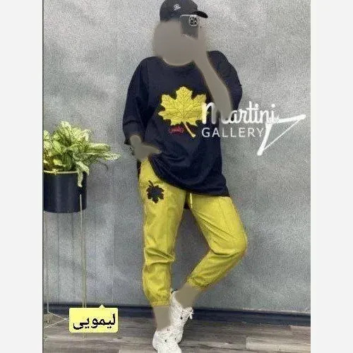 ست دوتیکه تیشرت لانگ و شلوار دمپا کش طرح برگ سایز بزرگ زنانه جنس دورس اسپان