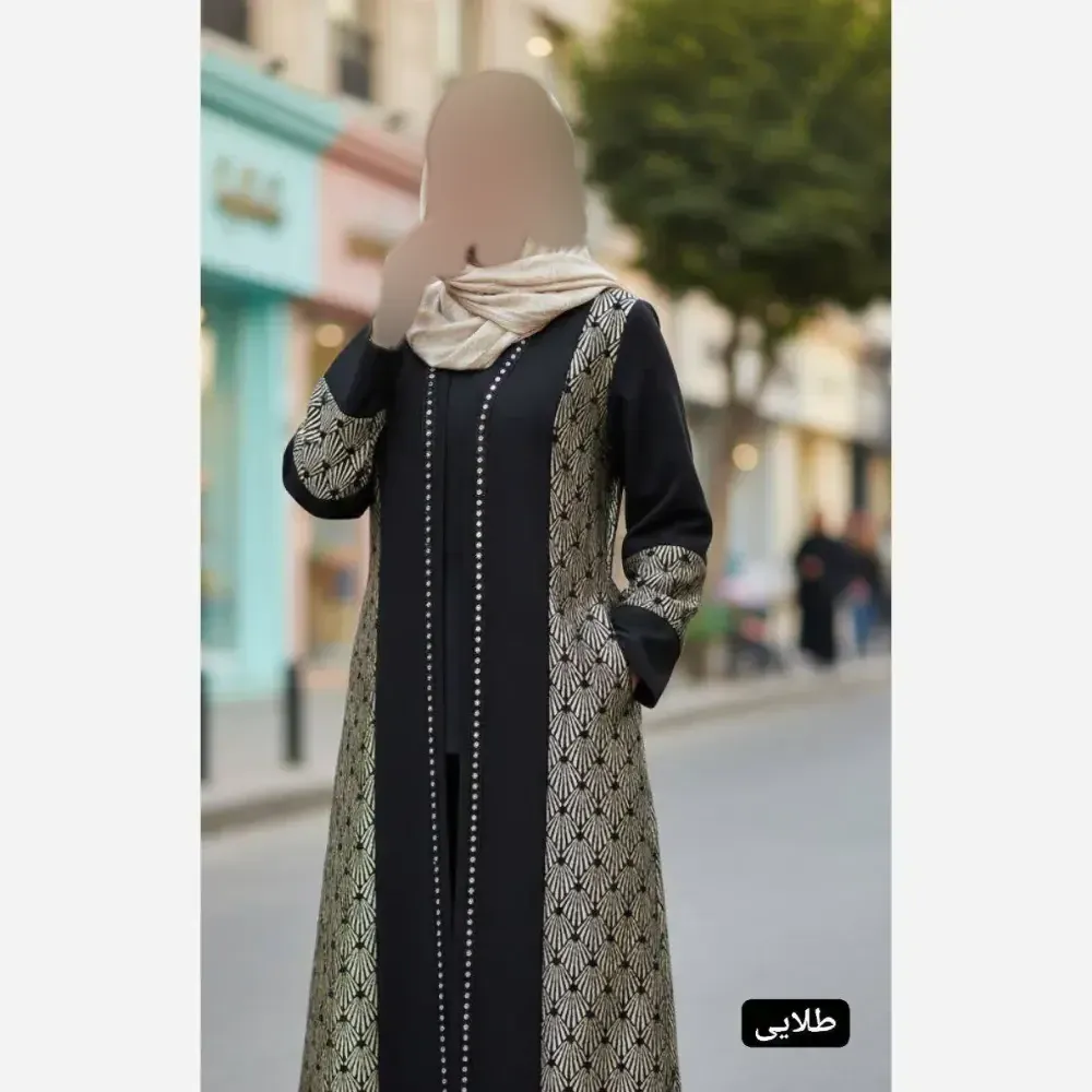 مانتو مجلسی زنانه مدل عاطی جنس کرپ مازراتی با خرجکار تافته رنگ مشکی طلایی