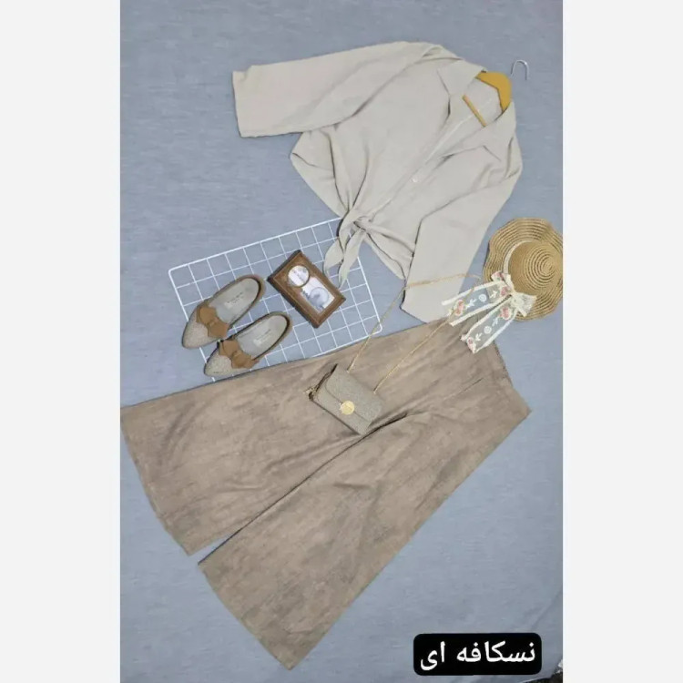 ست مانتو شلوار زنانه مدل ستاره جنس شانتون فری سایز تا 46 رنگ مشکی و کرمی