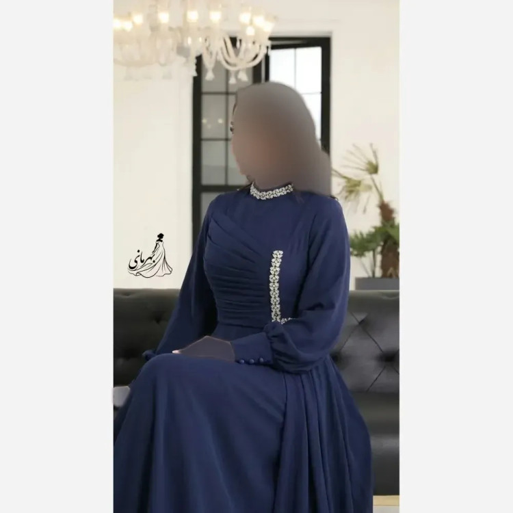 پیراهن مجلسی زنانه مدل زمرد جنس کرپ حریر سنگدوزی شده کاپدار و آستردار سایز 42 تا 50