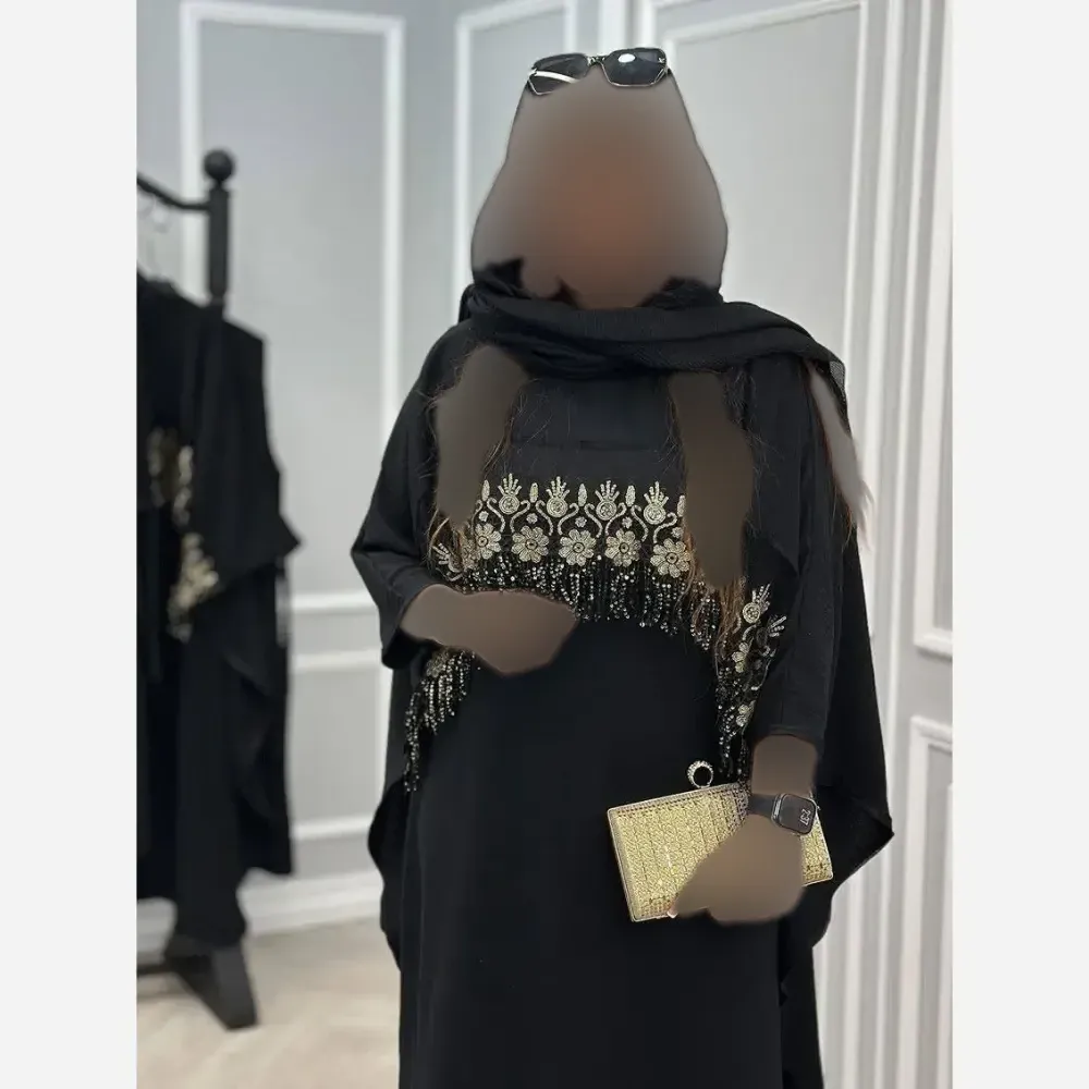 مانتو زنانه مدل نجلا جنس ابروبادی مشکی خرج کار طلایی فری سایز 38 تا 50