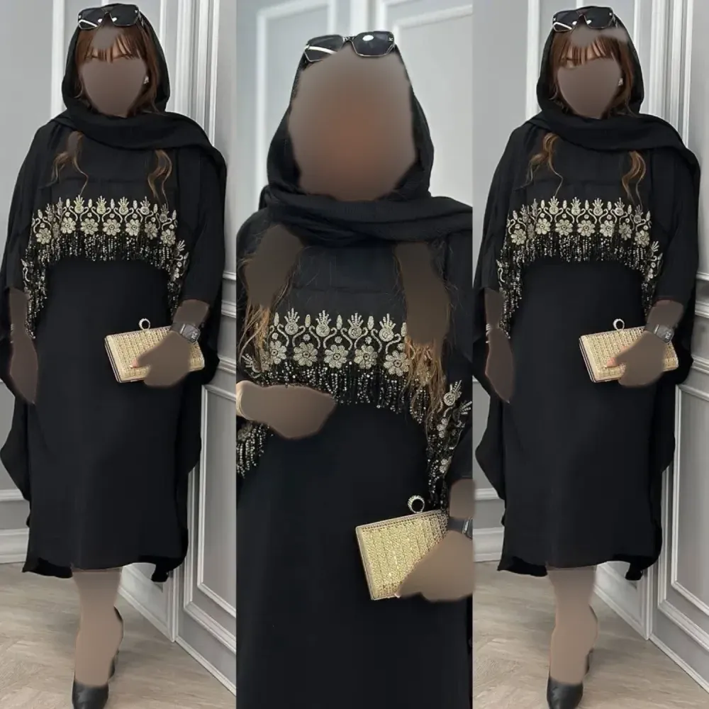 مانتو زنانه مدل نجلا جنس ابروبادی مشکی خرج کار طلایی فری سایز 38 تا 50