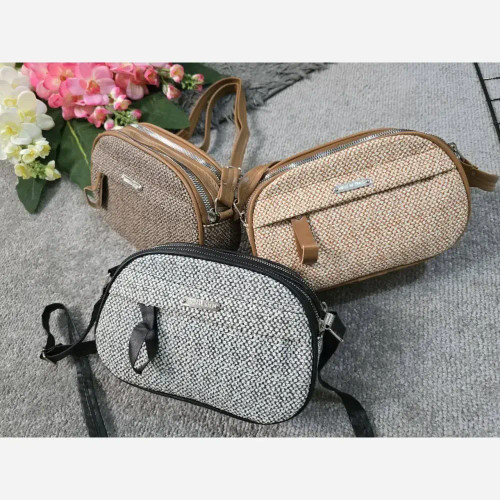 کیف زنانه آیدا جنس چرم طرح کنفی سه خونه