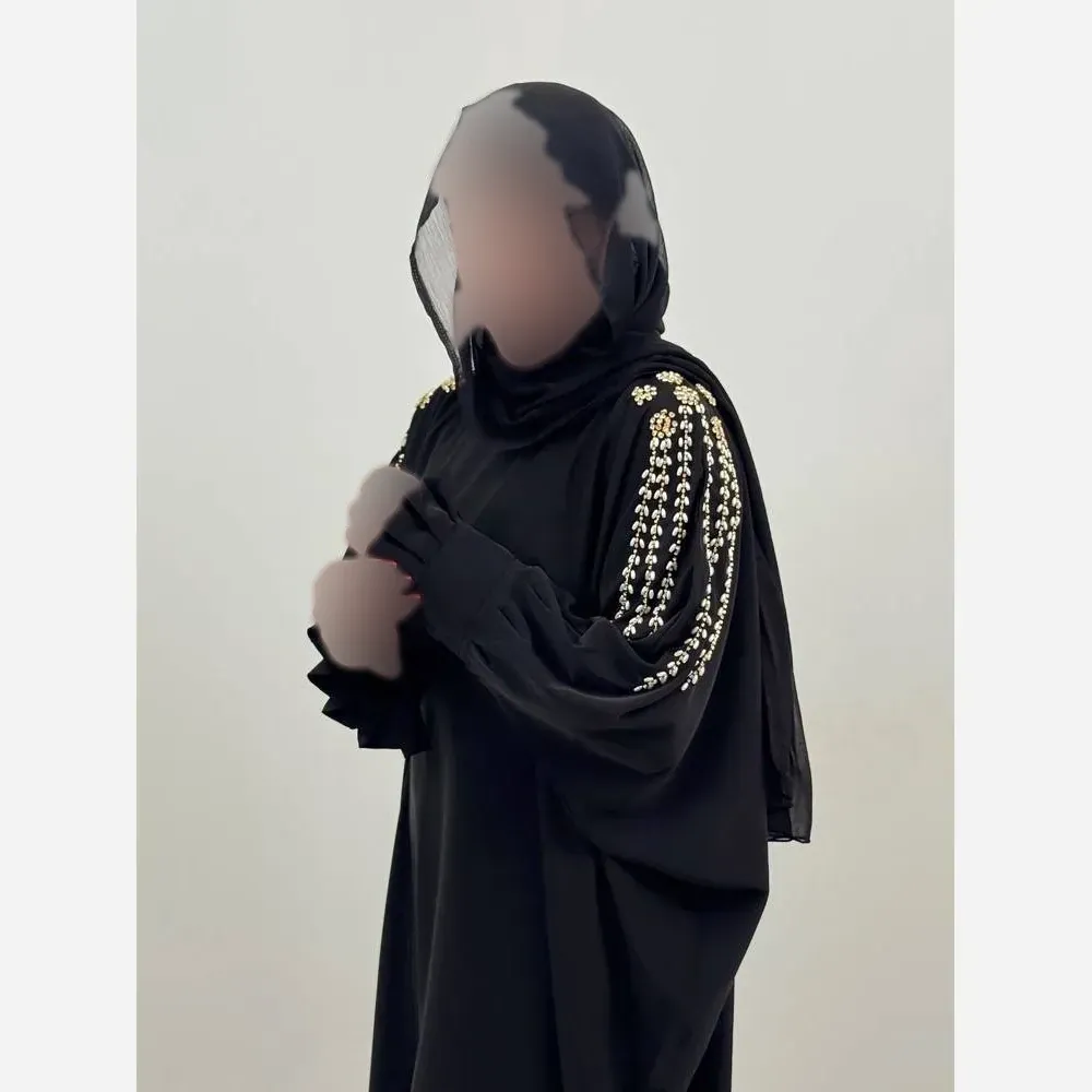 عبای زنانه مجلسی مشکی سرشونه طلایی جنس الیزه فری سایز 38 تا 60