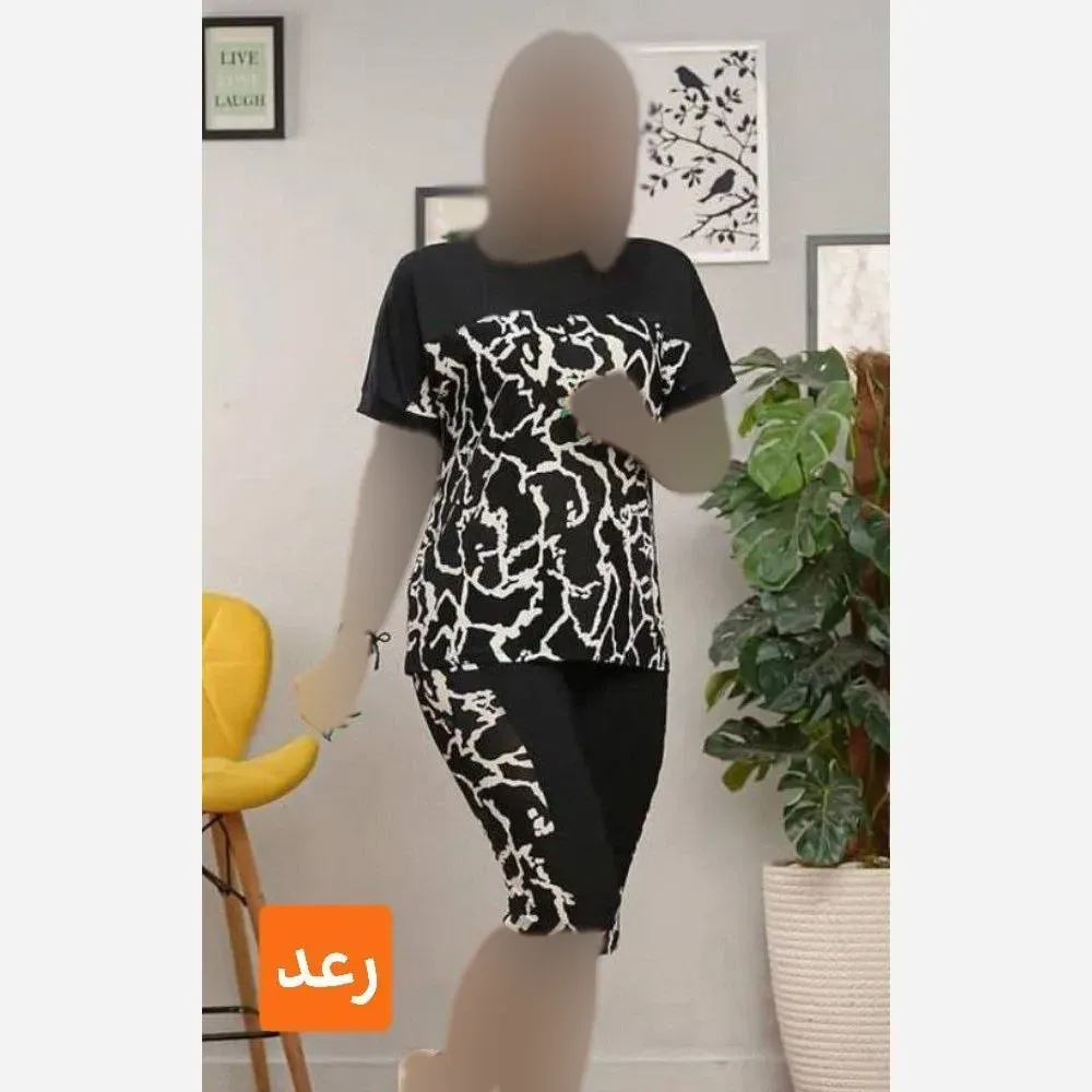 ست تیشرت و شلوارک زنانه مدل نیوشا جنس فلامنت کشی فری سایز 38 تا 46 طرح پلنگی و رعد و برقی