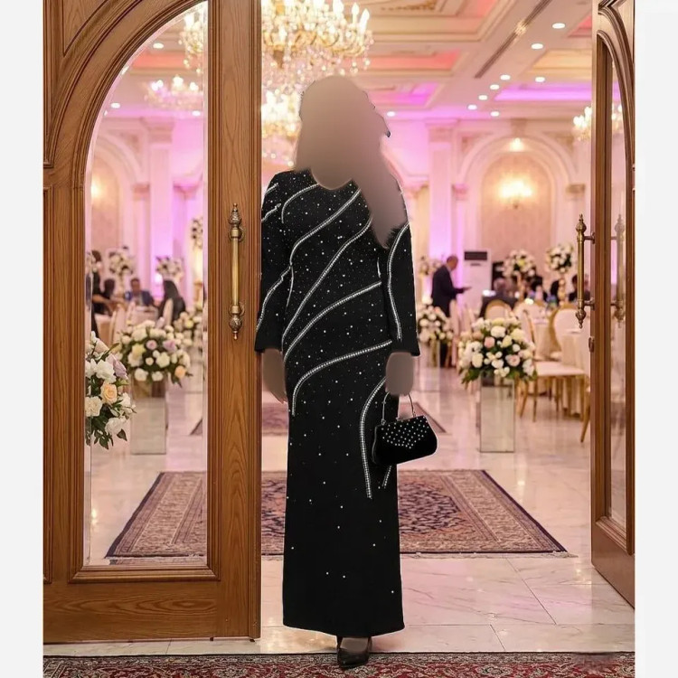 پیراهن زنانه مجلسی مدل غزل جنس کرپ دالقیچ مشکی با خرجکار نگین و مروارید سایز 38 تا 60