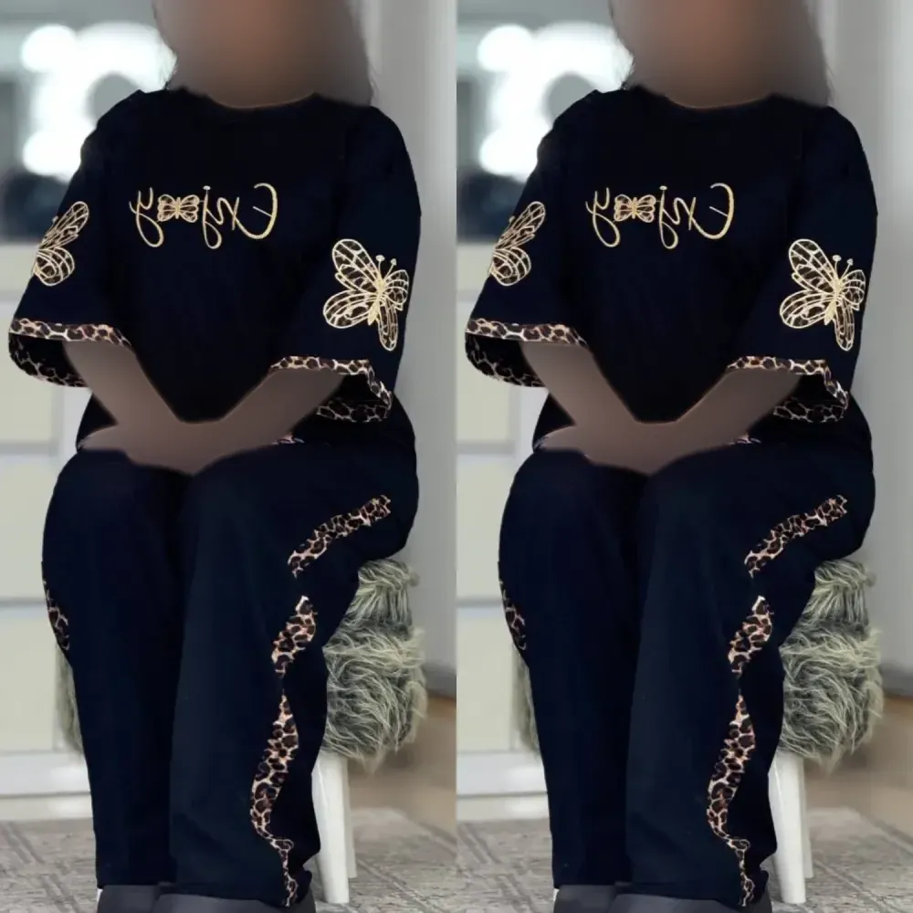 ست تیشرت و شلوار زنانه مدل enjoy جنس اسپان گلکسی رنگ مشکی فری سایز 38 تا 46