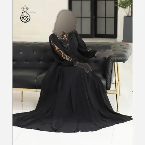پیراهن زنانه مجلسی کرپ حریر و خرجکار گل برجسته ترک رنگ مشکی